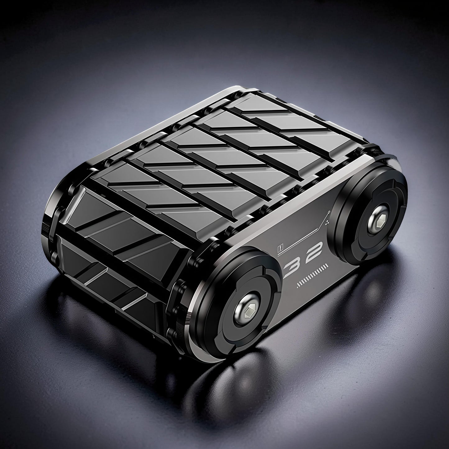 The Curious Mind Metal Tank Spinner, a tactical fidget toy with a metallic grey and black finish, featuring a textured top and wheel-like ends.