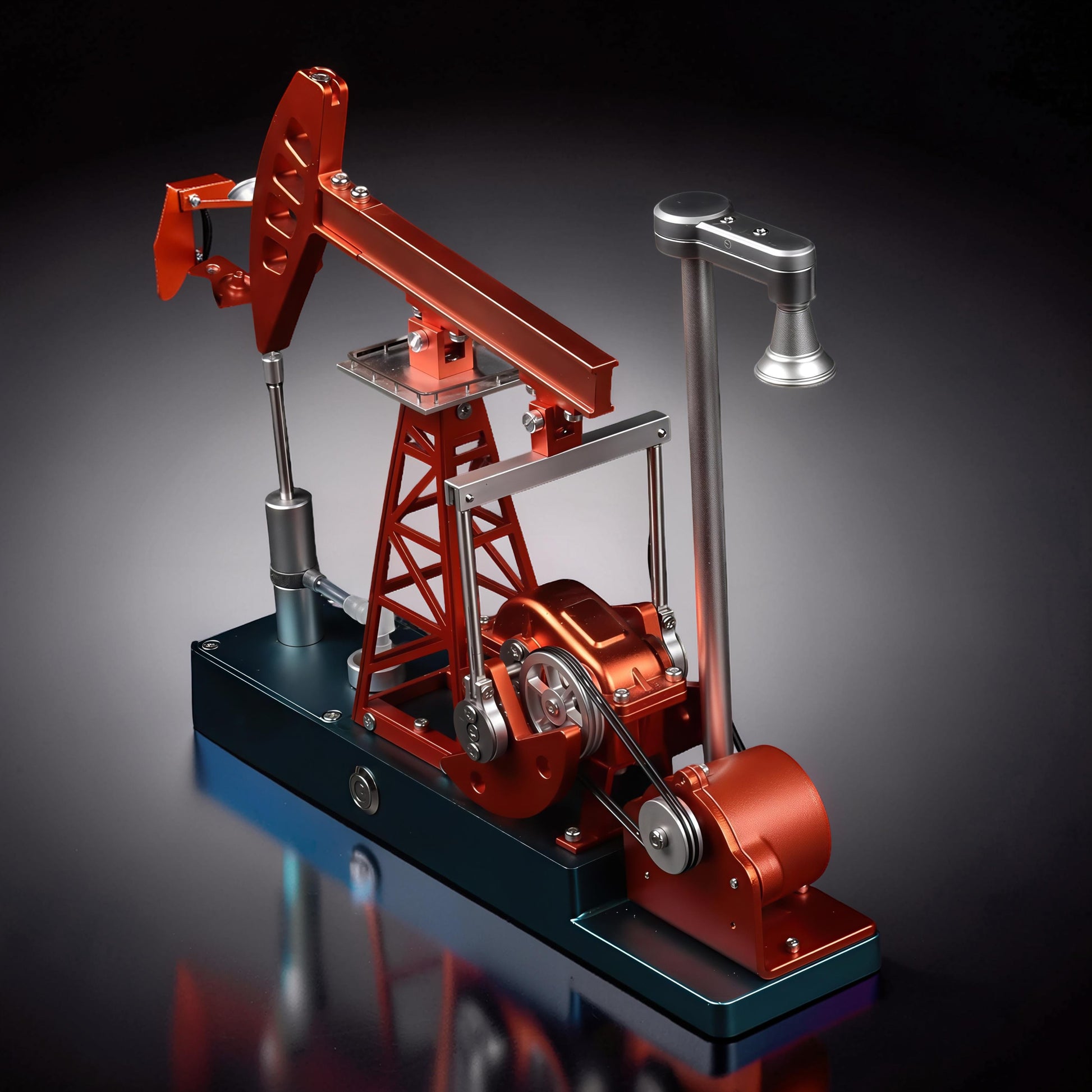 The Curious Mind Oil Derrick Pumping Unit DIY Kit, a detailed metal model with orange and blue components, featuring a mechanical pumping arm and engine.