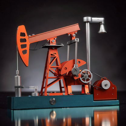 The Curious Mind Oil Derrick Pumping Unit DIY Kit, a detailed metal model with orange and teal accents, featuring intricate mechanical parts and a working pump.
