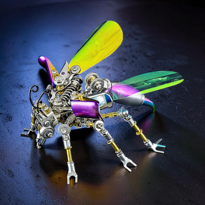 The Curious Mind Punk Wasp 3D metal model kit, a steampunk insect with metallic silver, purple, and gold accents, and iridescent wings.