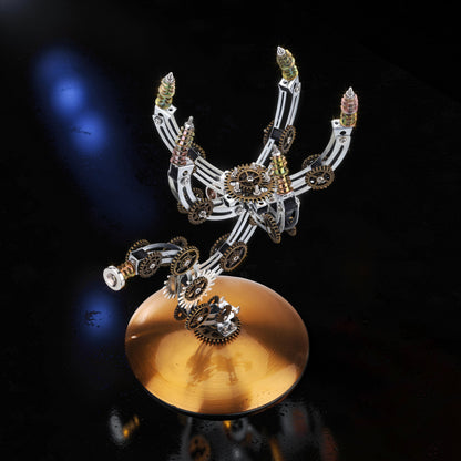 The Curious Mind Punk Wasp 3D metal model kit with gears and lights on a moon planet base.