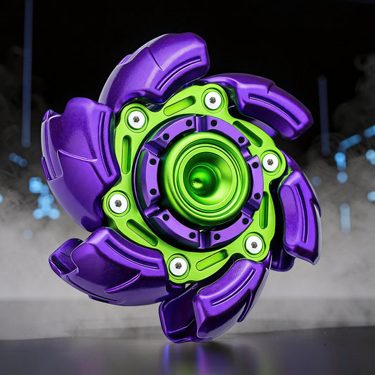 The Curious Mind Open Armour Hand Spinner: a metallic purple and green fidget spinner with intricate detailing and a central bearing.