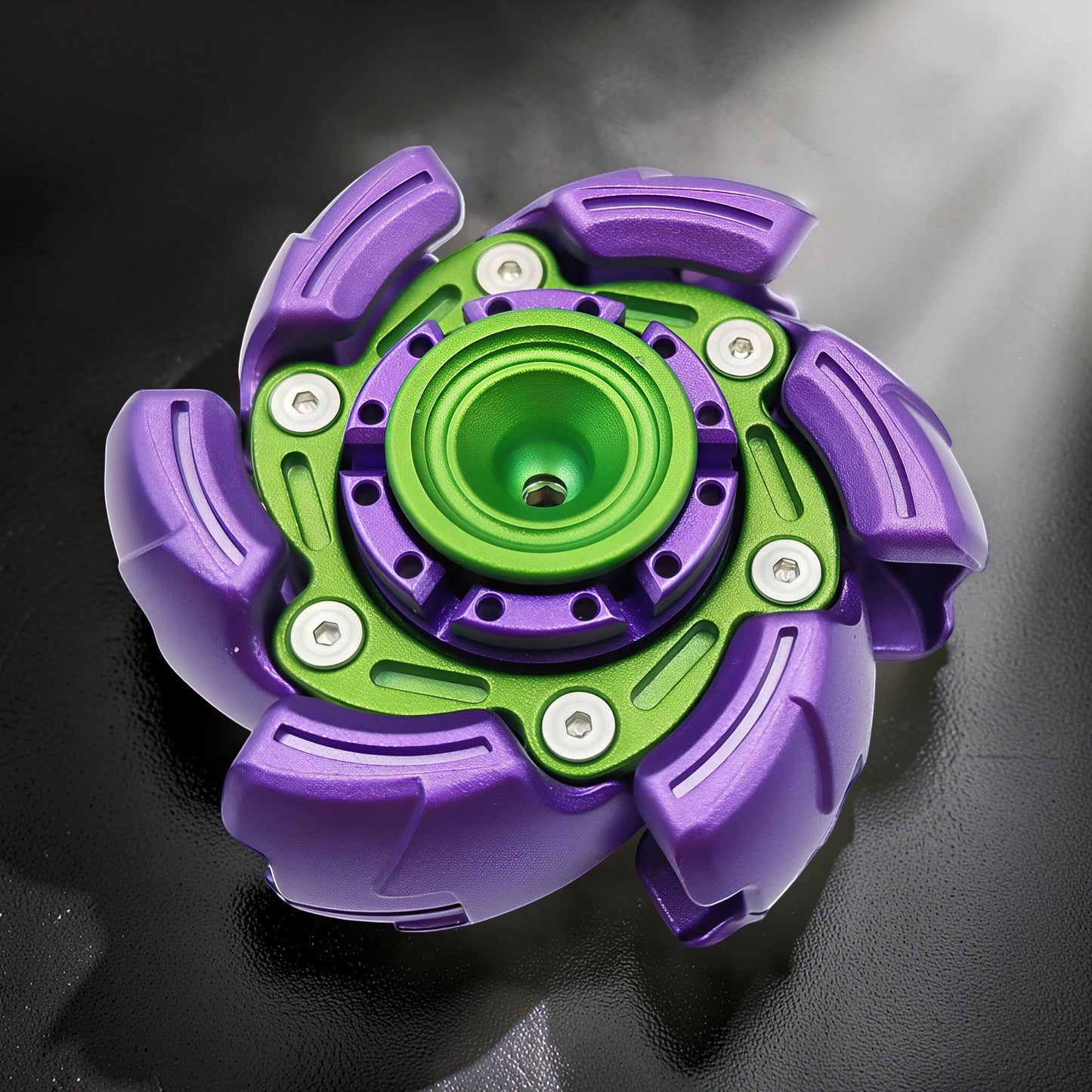 The Curious Mind Open Armour Hand Spinner is a metal fidget toy in purple and green with a balanced profile for smooth rotation.