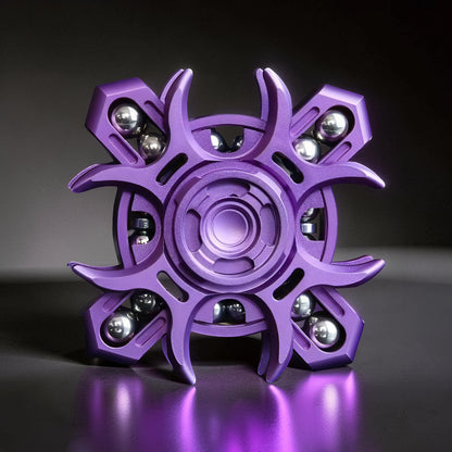 The Curious Mind Oracle metal EDC fidget spinner in purple, featuring a unique design with silver ball bearings for tactile focus and smooth movement.