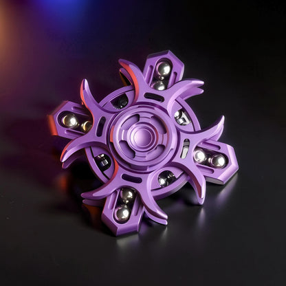 The Curious Mind Oracle Metal EDC Fidget Spinner in purple, featuring a unique gear-like design with silver bearings and a smooth matte finish.