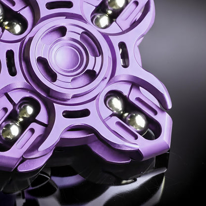 The Curious Mind Oracle Metal EDC Fidget Spinner in purple, featuring a precision metal build with smooth tactile action and silver bearings.