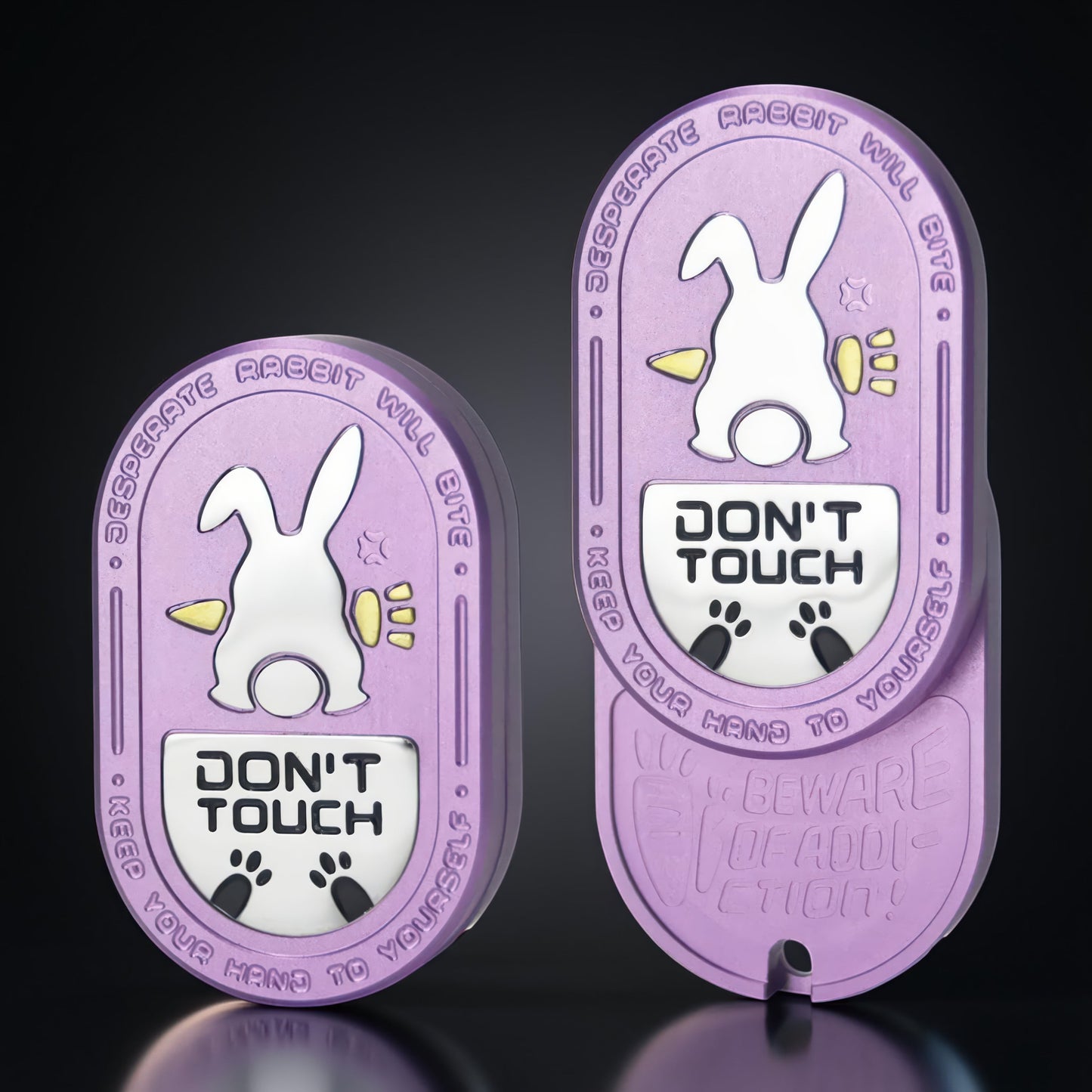 The Curious Mind Don't Touch Rabbit Slider fidget toy in purple metal with a white rabbit design and paw prints.