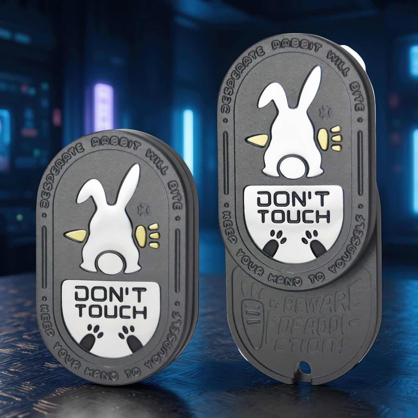 The Curious Mind Don't Touch Rabbit Slider fidget toy with a white rabbit design and grey metal body.