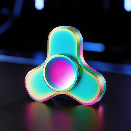 The Curious Mind Mini Elf Hand Spinner, a premium EDC metal spinner with a rainbow iridescent finish and three balanced lobes.