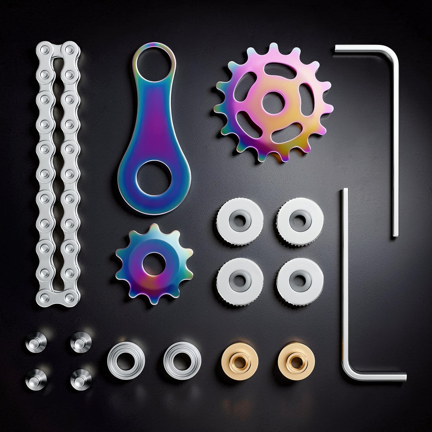 The Curious Mind Gear Chain Sprocket Spinner fidget toy with rainbow iridescent metal sprockets and silver chain.