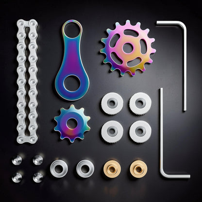 The Curious Mind Gear Chain Sprocket Spinner fidget toy with rainbow iridescent metal sprockets and silver chain.