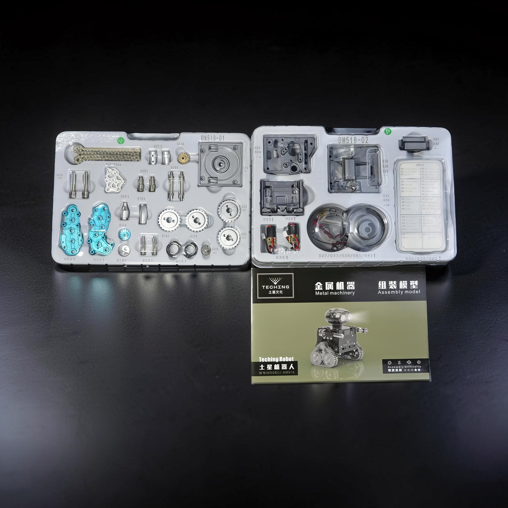The Curious Mind RC Tank Robot DIY Kit features metal parts and blue accents for assembly. Includes gears, screws, and electronic components.