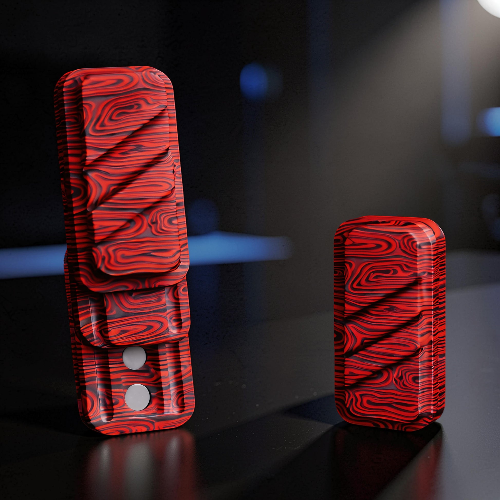 The Curious Mind Three-Layer Push Card Slider in red and black Damascus metal, compact fidget toy for stress relief.
