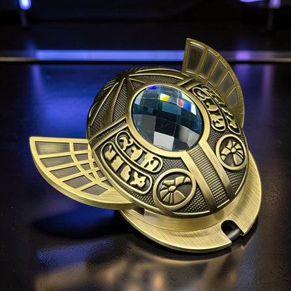 The Curious Mind Scarab Metal EDC Fidget Spinner with intricate Egyptian-inspired detailing and a faceted gem.