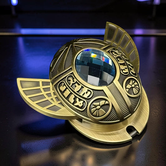 The Curious Mind Scarab Metal EDC Fidget Spinner with intricate Egyptian-inspired detailing and a faceted gem.