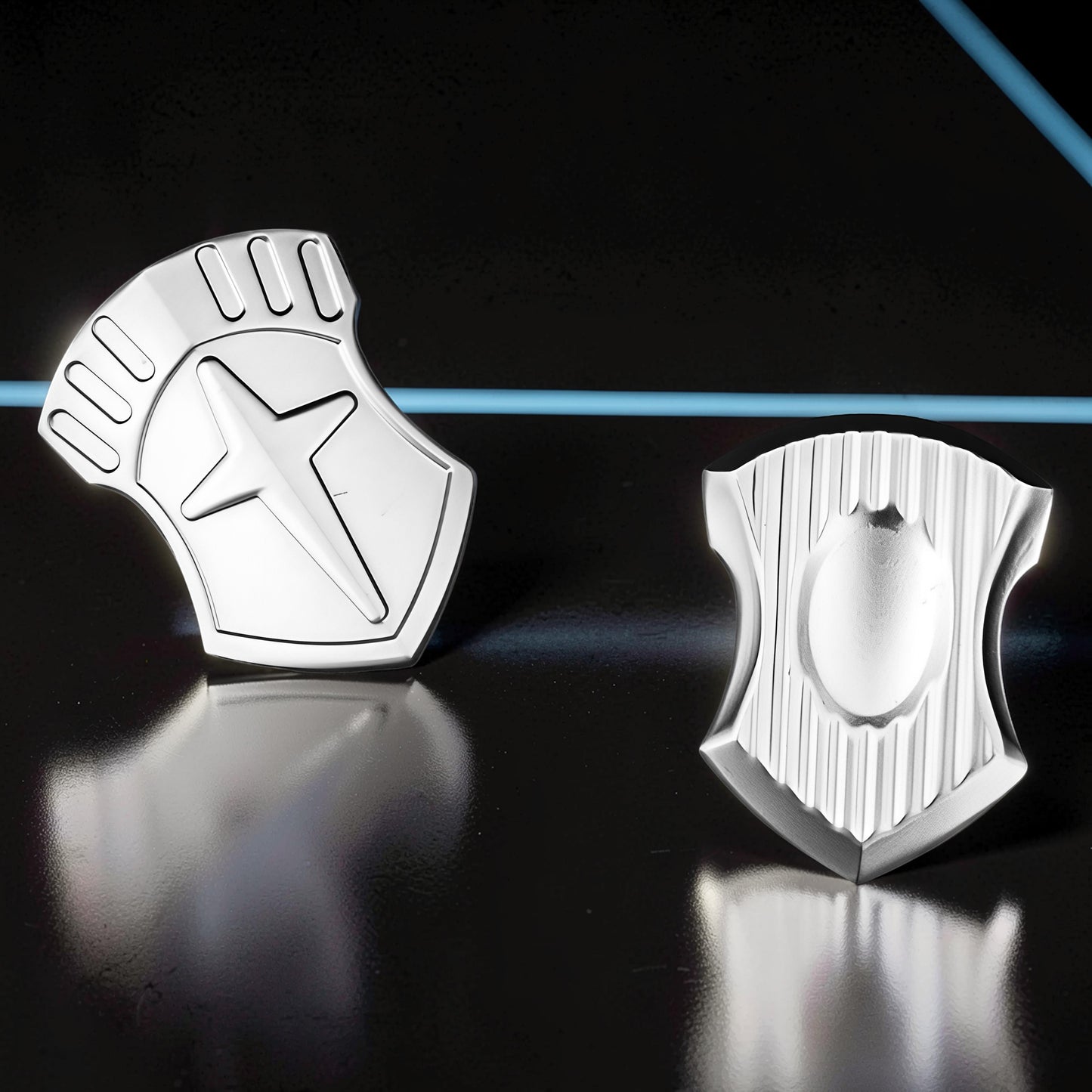 The Curious Mind Shield Fingertip Spinner, a compact EDC metal spinner with a star design and ribbed detailing.