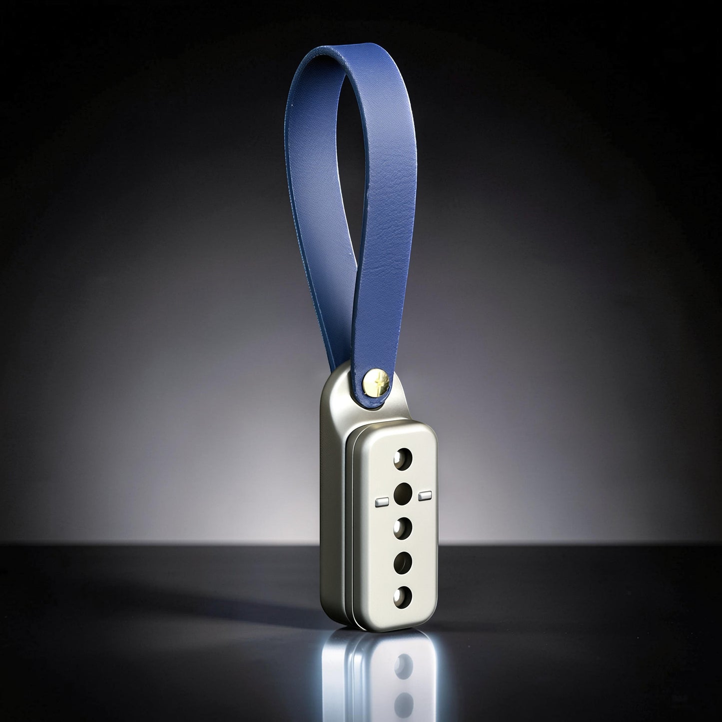 The Curious Mind Silver Buckle Card Slider fidget toy with blue leather loop. Zinc alloy construction.