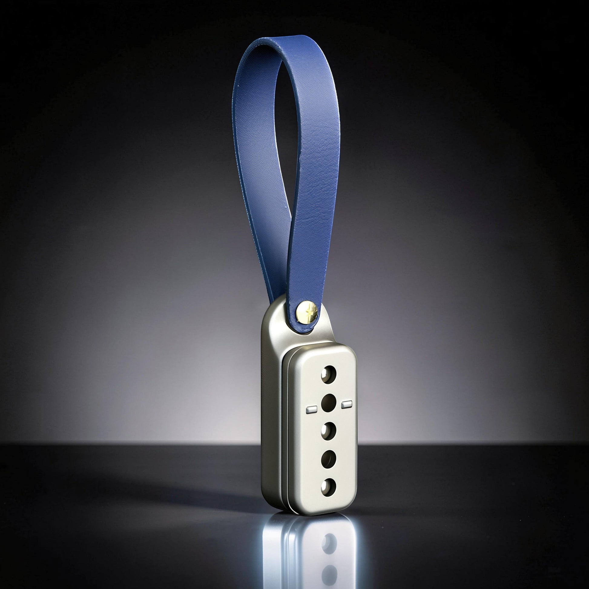 The Curious Mind Silver Buckle Card Slider fidget toy with blue leather loop. Zinc alloy construction.