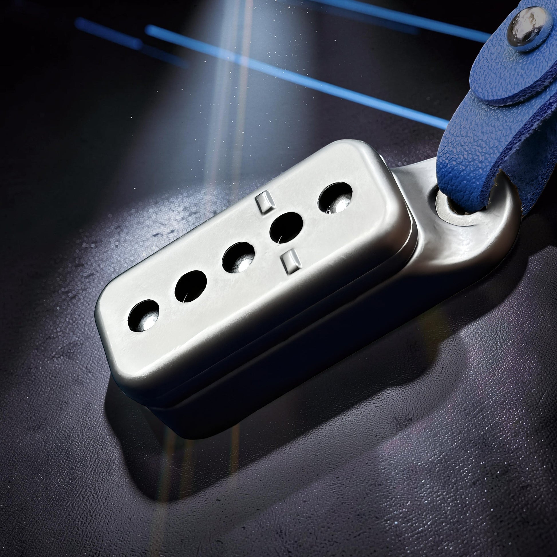 The Curious Mind Silver Buckle Slider fidget toy made of zinc alloy with a blue leather strap.