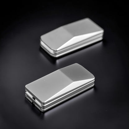 The Curious Mind Cyberpunk Truck Push Slider, a compact silver metal fidget toy with a sleek, angular design for stress relief and focus.
