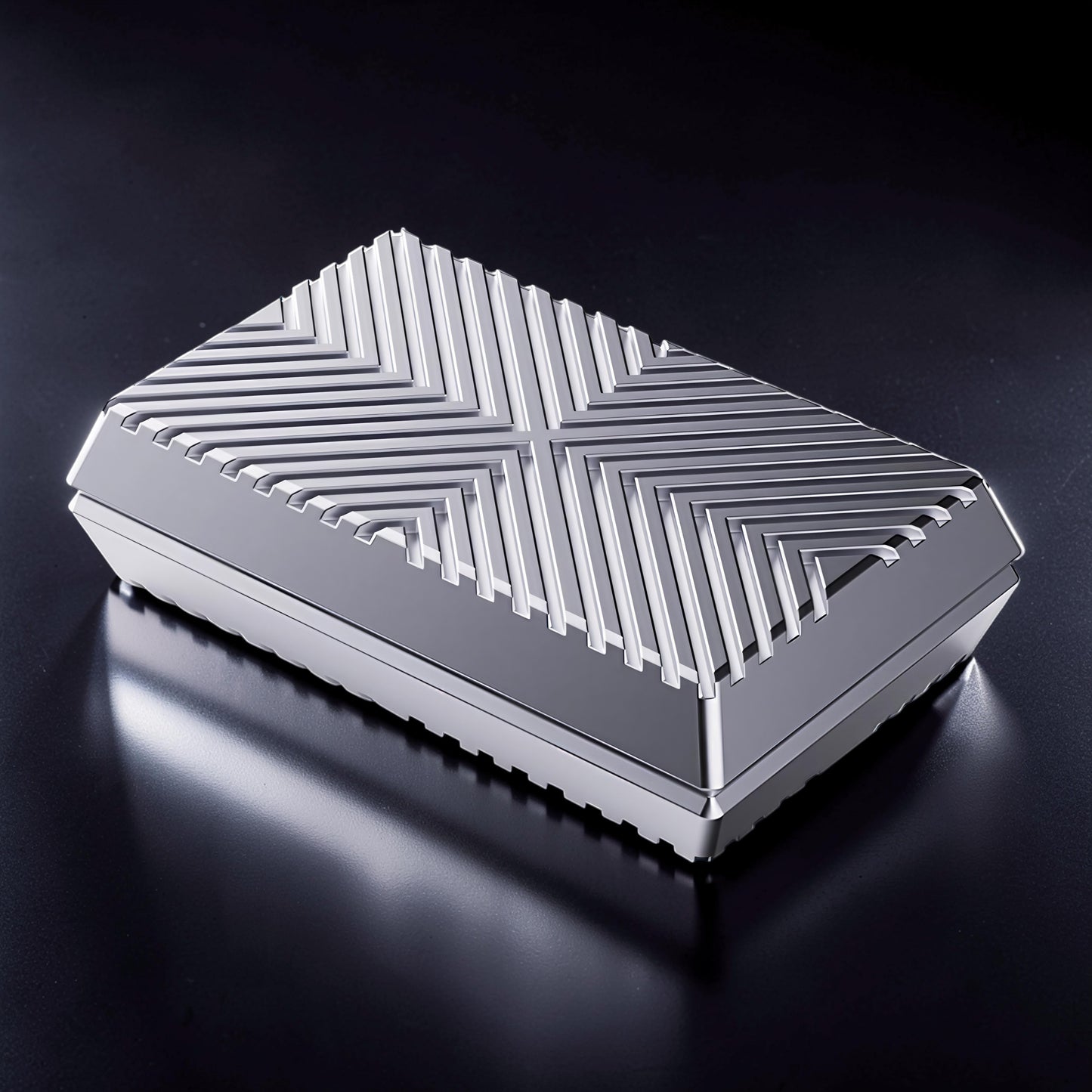 The Curious Mind Cube Push Slider fidget toy, a compact silver metal cube with a geometric grooved top for tactile stimulation.