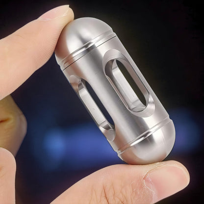 The Curious Mind silver metal egg pocket spinner with smooth, satisfying rotation and a pocket-friendly format.