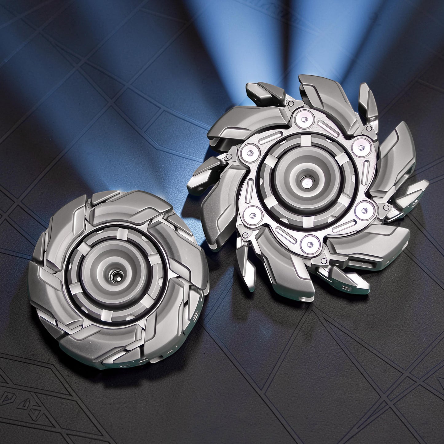 The Curious Mind Open Armour Magnetic Spinner in silver metal, featuring a futuristic, segmented design with magnetic accents for tactile play.