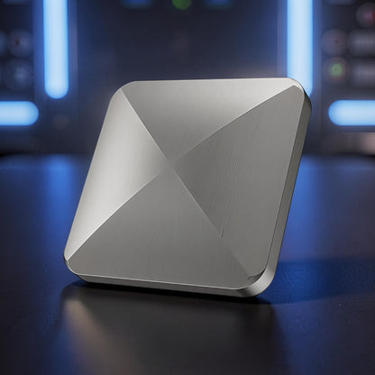 The Curious Mind Flipo Flip Square Desk Spinner, brushed aluminum kinetic sculpture with faceted design for focus and stress relief.