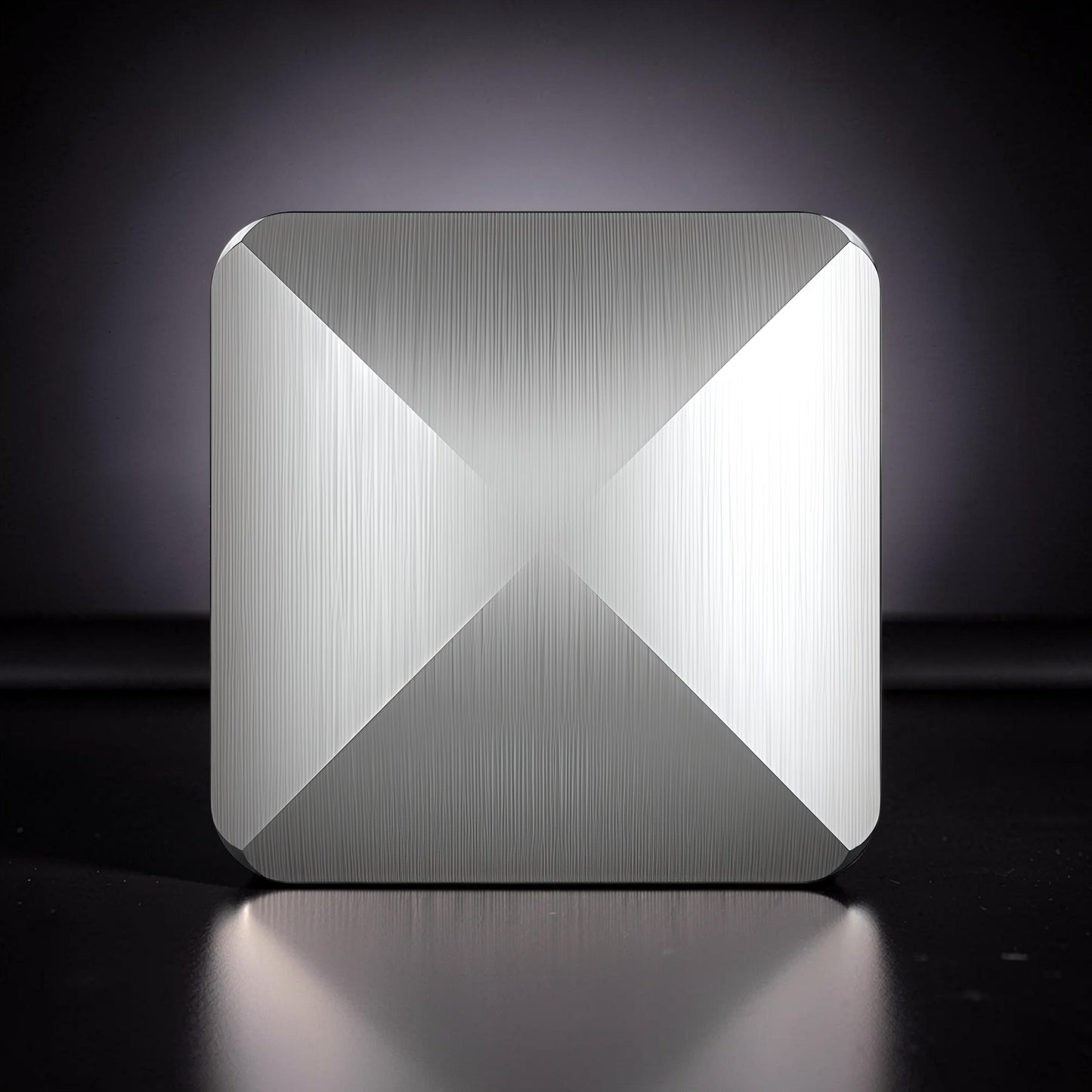The Curious Mind Flipo Flip Square Desk Spinner, brushed aluminum kinetic sculpture with faceted design for focus and stress relief.