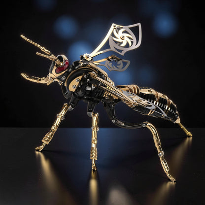 The Curious Mind Stainless Wasp 3D metal model kit, featuring intricate gold and black metallic details, mechanical wings, and a steampunk aesthetic.