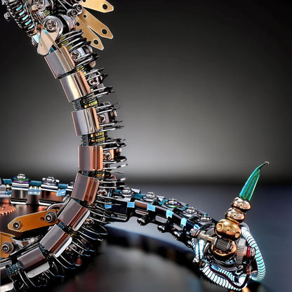 The Curious Mind Steampunk Cobra 3D metal model kit with intricate mechanical details and a green jewel-like head.