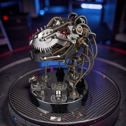 The Curious Mind Steampunk dinosaur head model kit, made of polished metal with intricate gears and tubing. Features movable parts and a red laser eye detail.