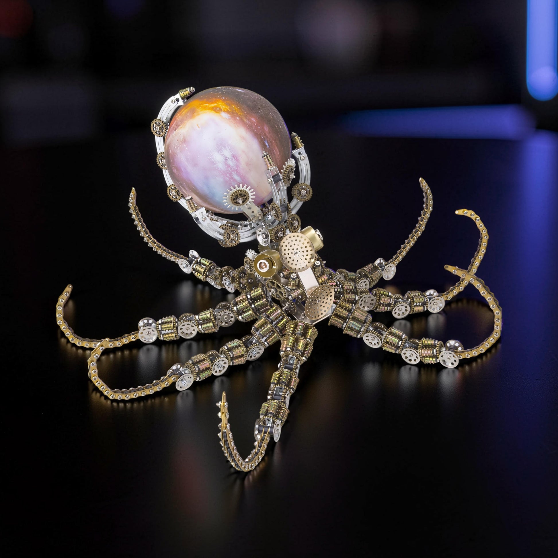 The Curious Mind Steampunk Octopus metal model kit with colourful lights and a pearlescent sphere head.