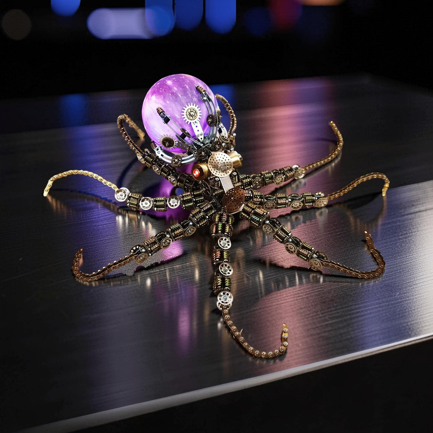 The Curious Mind Steampunk Octopus metal model kit with colourful lights and intricate gears. A unique desktop display piece.