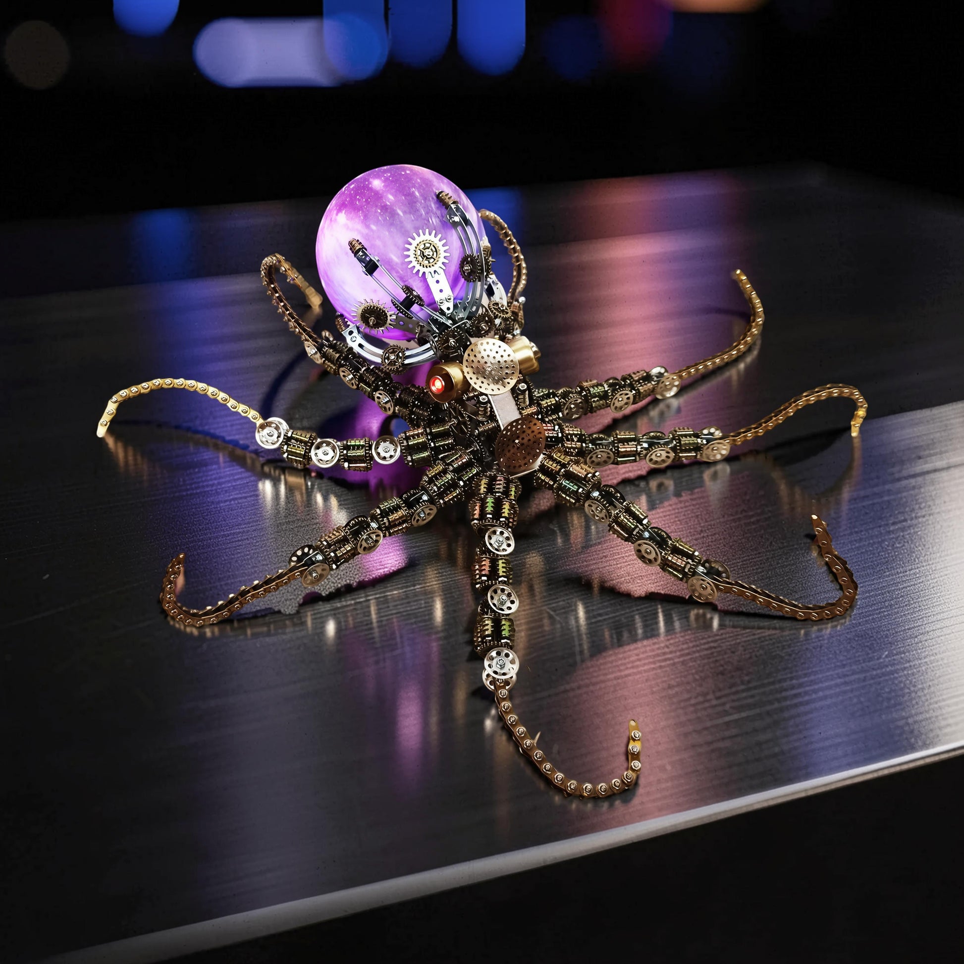 The Curious Mind Steampunk Octopus metal model kit with colourful lights and intricate gears. A unique desktop display piece.