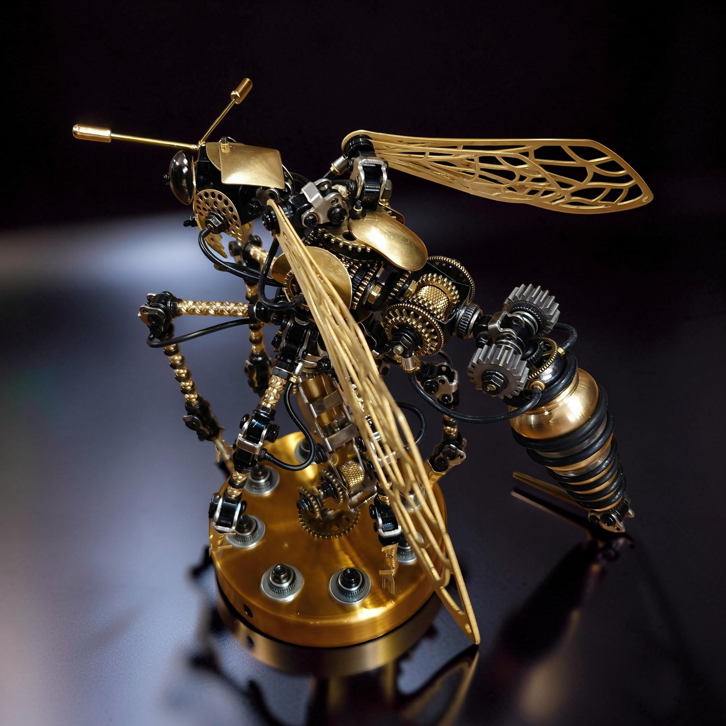 The Curious Mind Wasp with Voice-Activated Light, a steampunk metal model kit with intricate gears and gold accents.