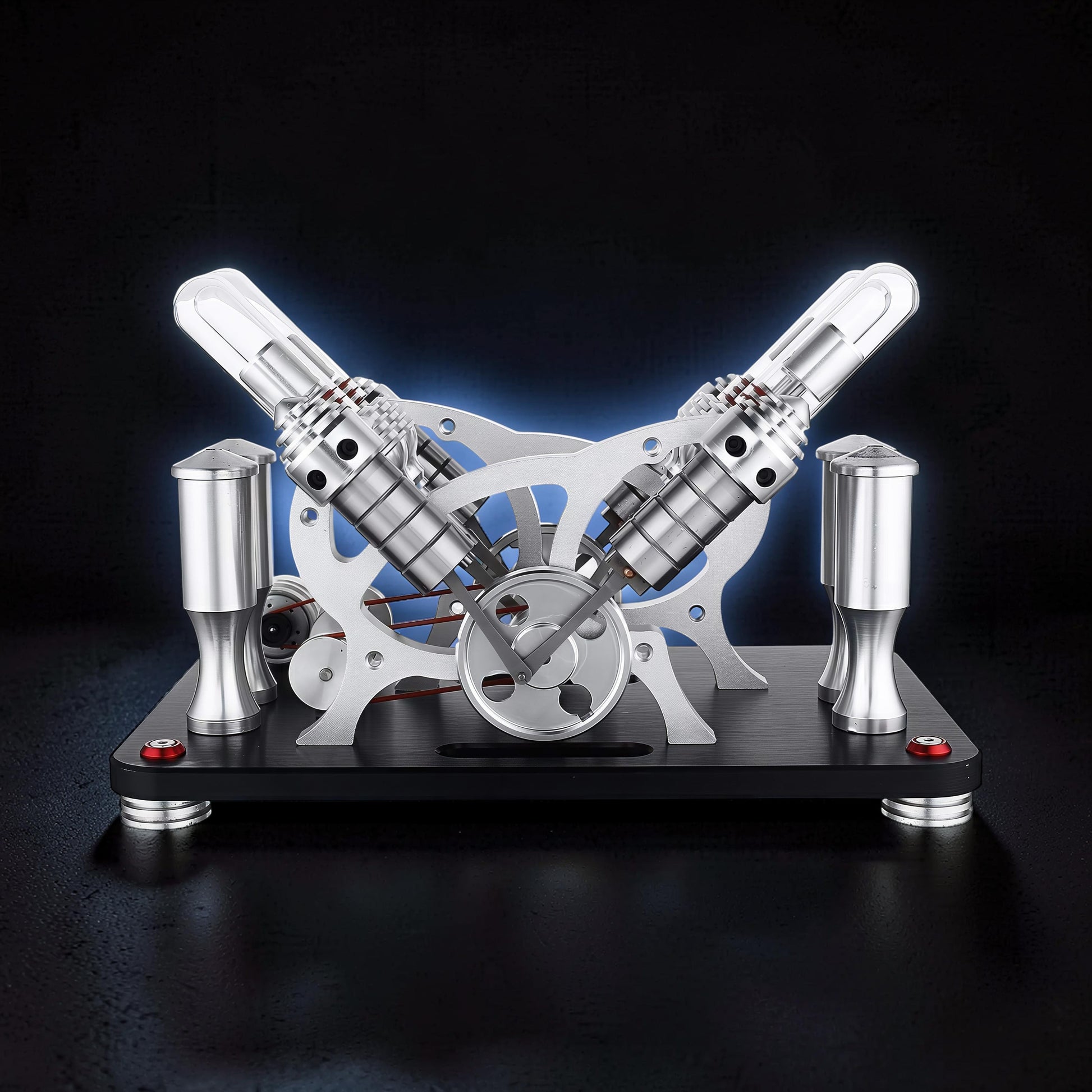 The Curious Mind Stirling Engine V4 Display Model, a metal mechanical model with dual cylinders and a flywheel, ideal for desks and gifts.