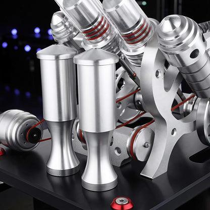 The Curious Mind Stirling Engine V4 Display Model, a metal mechanical model with red accents and intricate moving parts, ideal for desktop display and engineering enthusiasts.