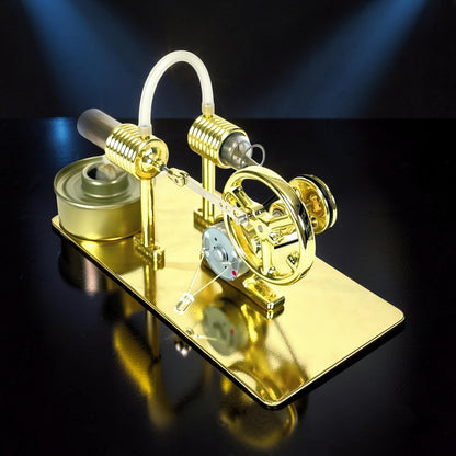 The Curious Mind Classic Stirling Engine DIY Kit, a polished gold metal interactive build model with a flywheel and connecting rods.