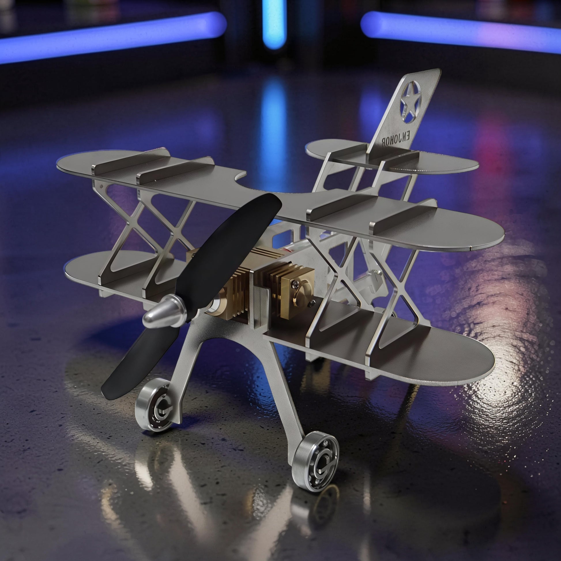 The Curious Mind Stirling Engine Model Aircraft, a silver metal biplane with a black propeller and visible mechanical engine components.