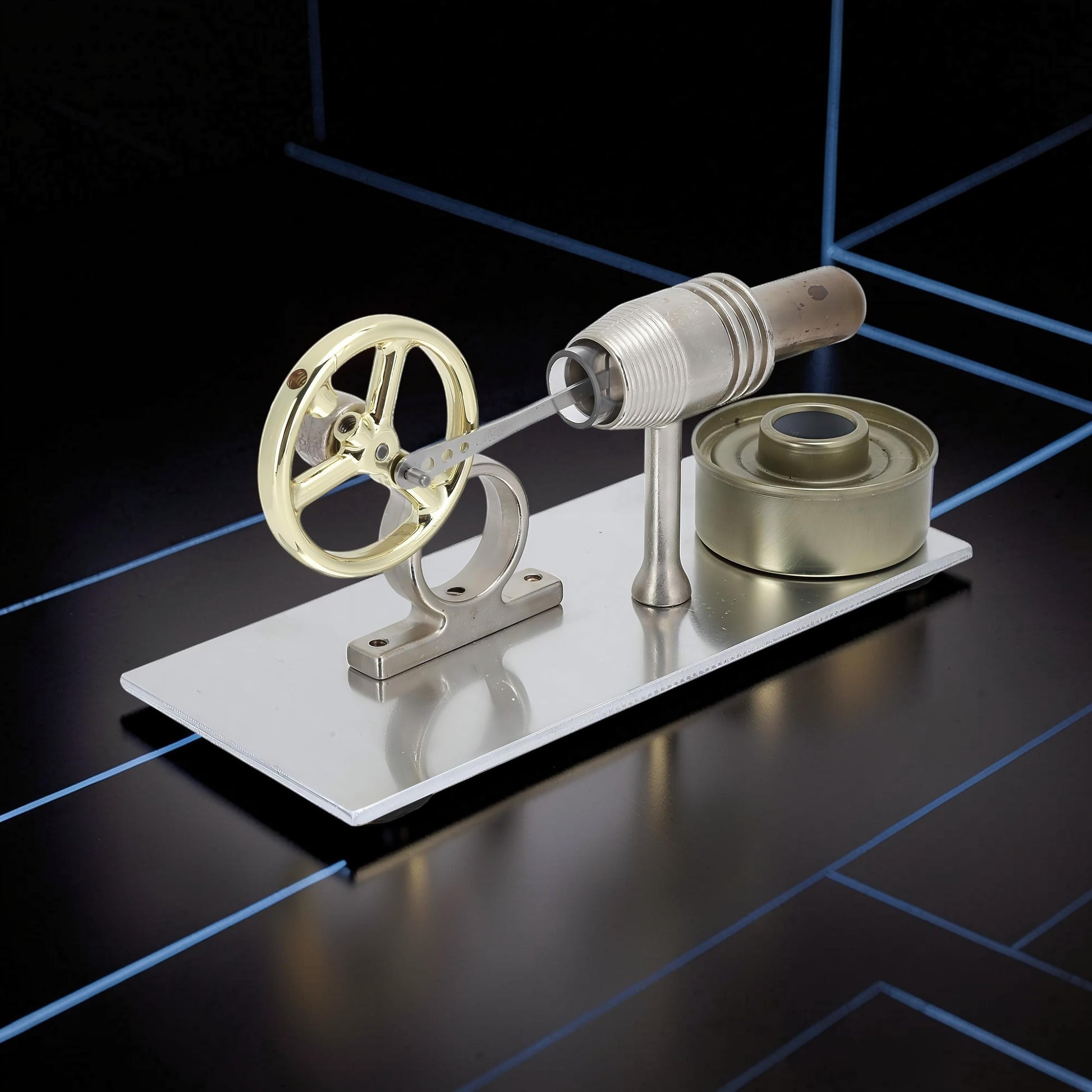 The Curious Mind Classic Stirling Engine Display mechanical model, made of metal with a gold flywheel and silver base. Ideal for desktop display.