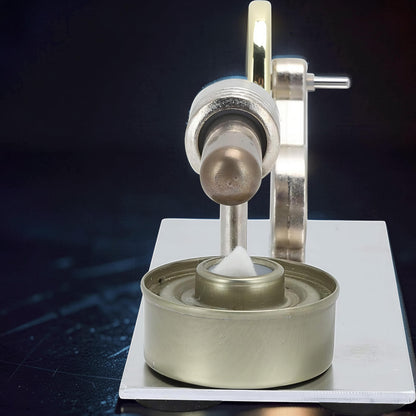 The Curious Mind Classic Stirling Engine Display mechanical model with metal construction and a cotton wick in a fuel cup.