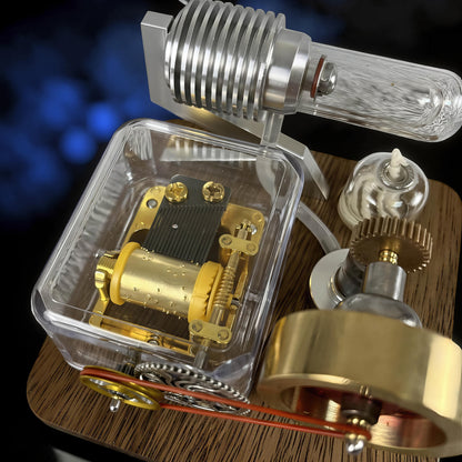 The Curious Mind Stirling Engine Music Box with metal, wood, and quartz glass construction. Features visible gears and a music box mechanism.