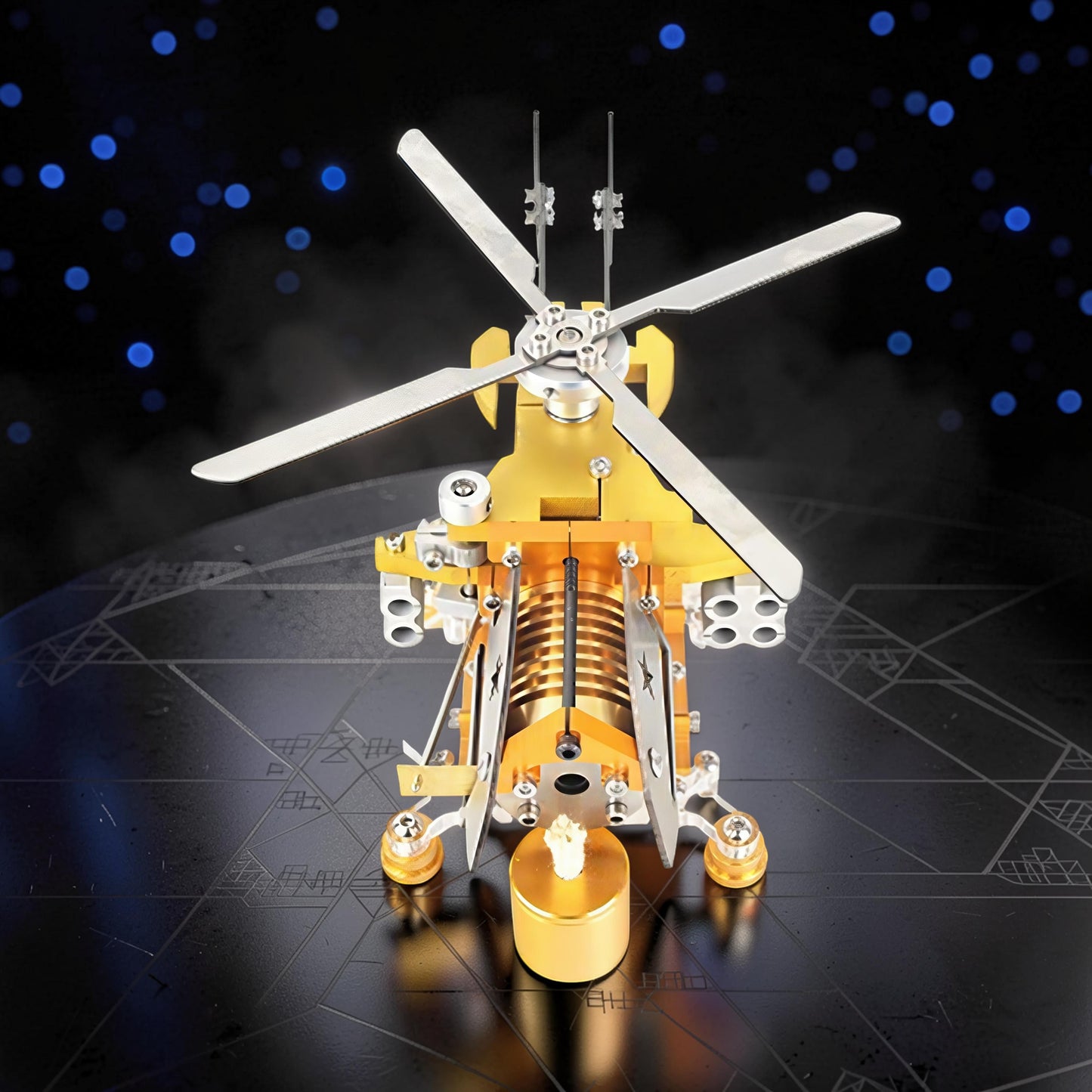 The Curious Mind Fire-Absorbing Stirling Helicopter Model, a detailed metal engine display with gold and silver finishes, featuring spinning blades and a running science display.