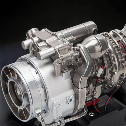 The Curious Mind T700 Turboshaft Engine DIY Kit, a detailed metal model powerplant with intricate components and red wiring.