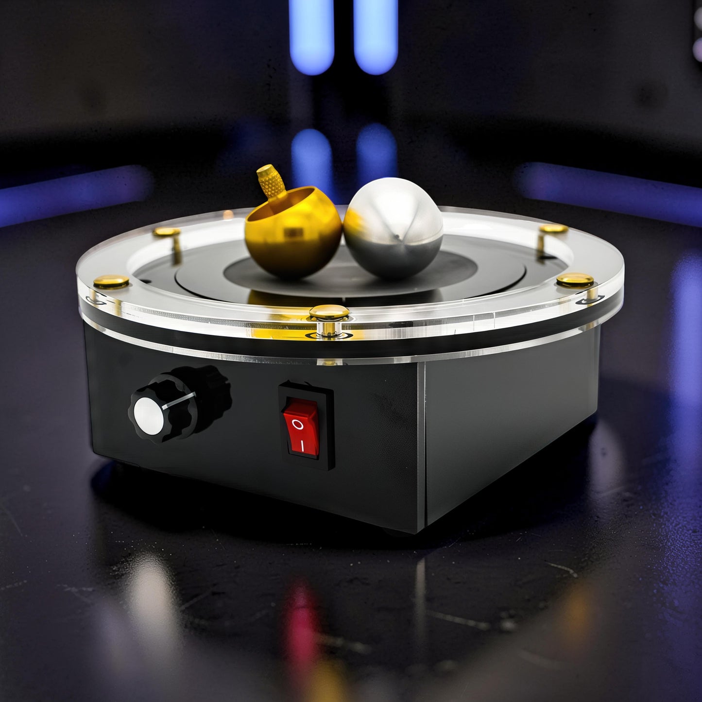 The Curious Mind Tesla Columbus Eggs Experiment Set with gold spinning top and silver egg on a black base with clear acrylic top.