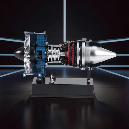 The Curious Mind Mini Turbofan Engine DIY Kit model, featuring intricate details of internal components, blue housing, silver fan blades, and red turbine elements, displayed on a black stand.