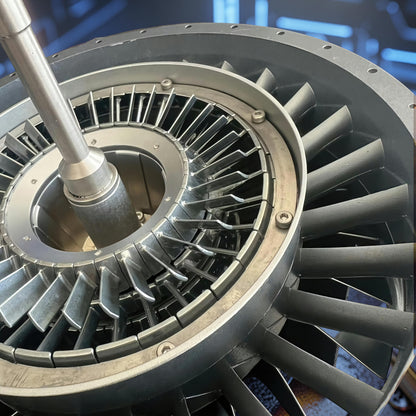 The Curious Mind Large Turbofan Engine DIY Kit, a detailed metal model with intricate fan blades and central shaft.