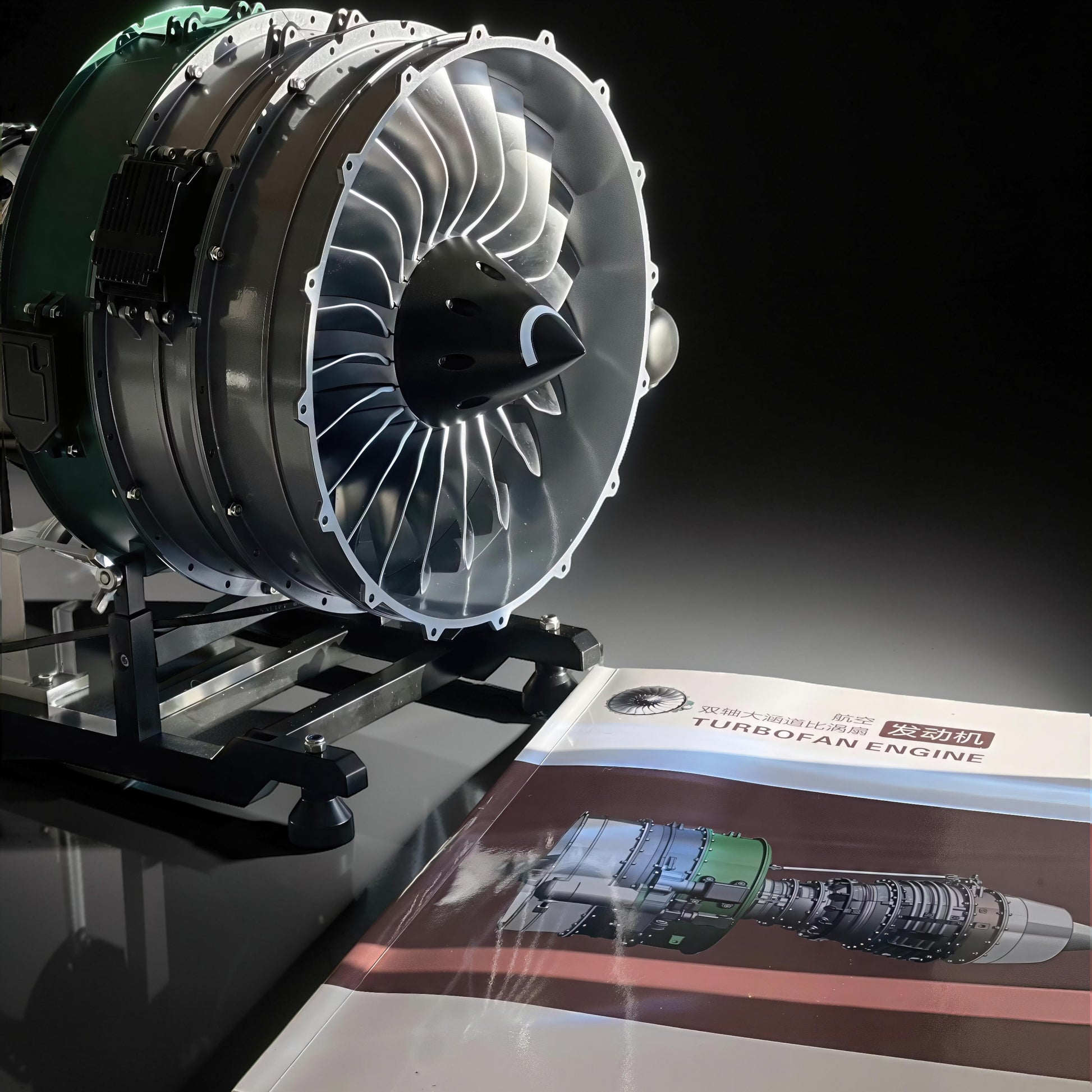 The Curious Mind Large Turbofan Engine DIY Kit, a detailed metal model with intricate fan blades and a display stand.