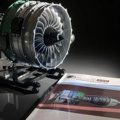The Curious Mind Large Turbofan Engine DIY Kit, a detailed metal model with intricate fan blades and a display stand.